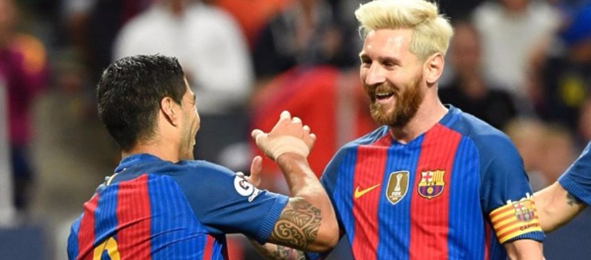 Suárez y Messi celebran la victoria del Barça ante el Betis. Foto: Twitter.